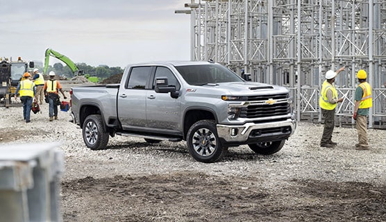 A GM Envolve Pickup Truck parked at a construction site.