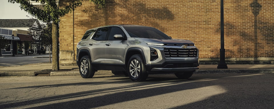 2026 Chevrolet Equinox parked outdoors beside a wall.