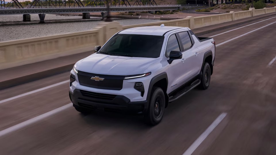Chevrolet Silverado EV driving alone on the road.