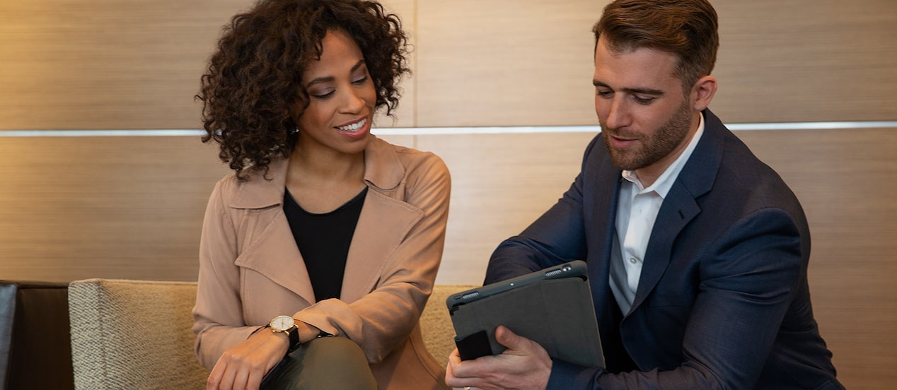A GMC salesman assisting a customer.