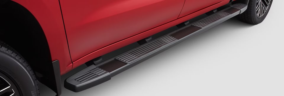 Close-up view of the Black-colored Side Step on a GM Envolve vehicle.