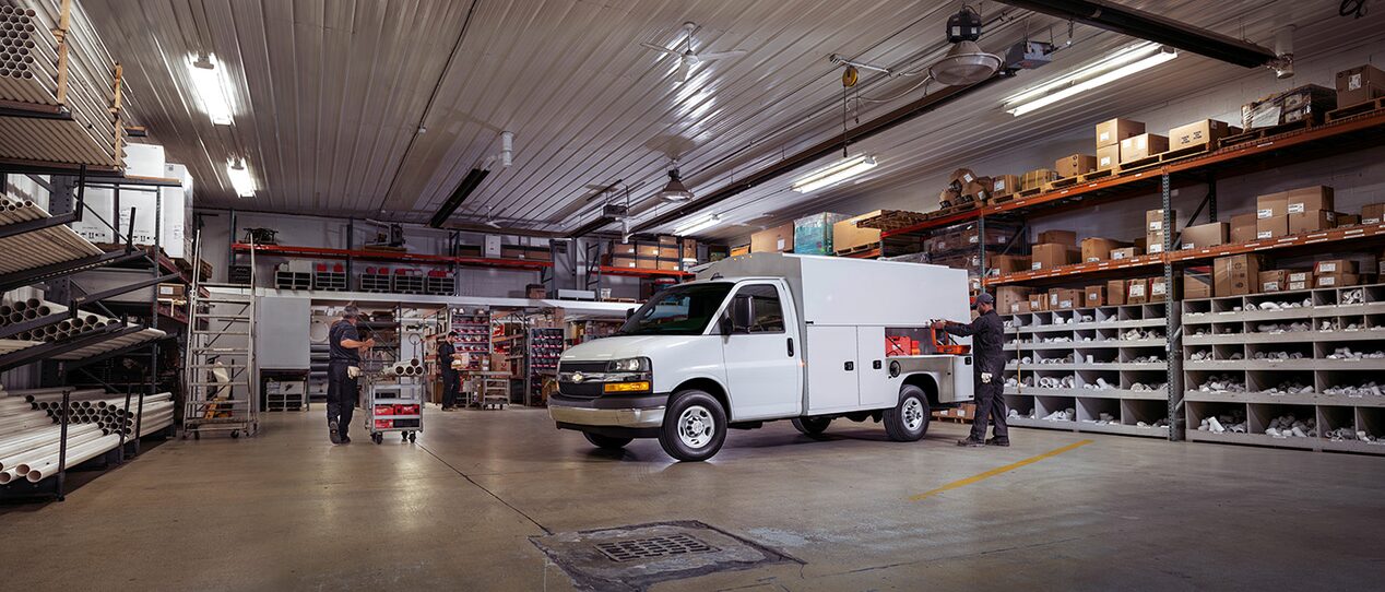 GM Fleet personnel attaching Upfit Applications to a GM vehicle.