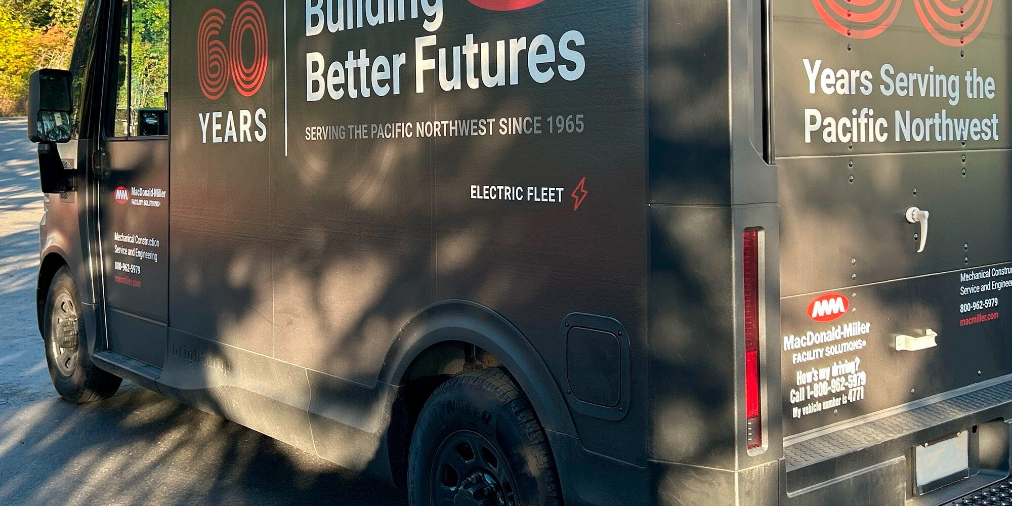 A Chevrolet Brightdrop with Macdonald Miller branding, viewed in closeup