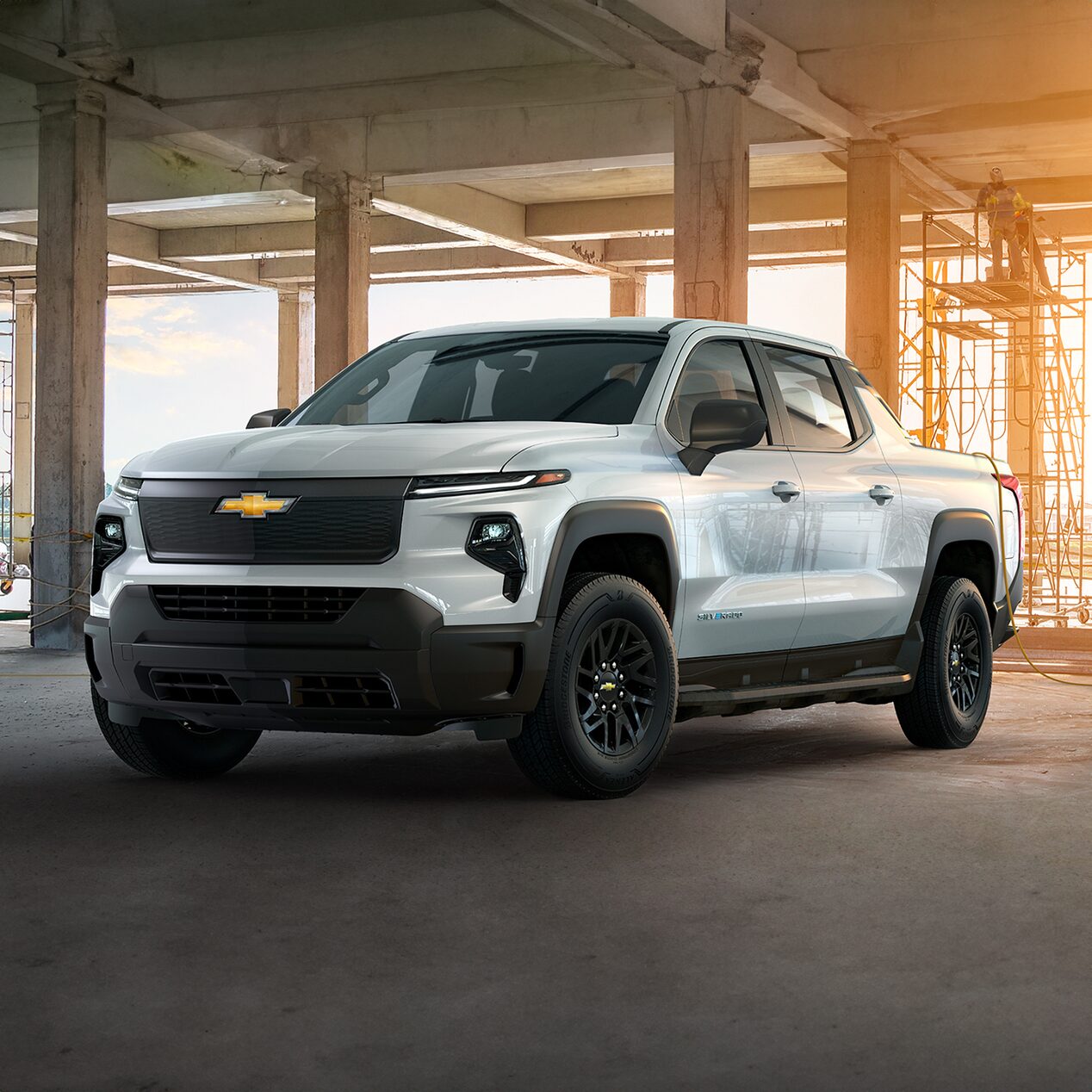 2025 Chevrolet Silverado EV parked in three-quarter view on a job site
