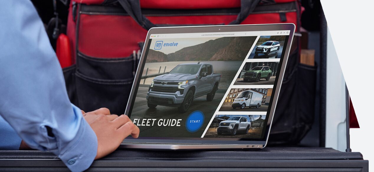Hands Type on a Laptop With Text "Fleet Guide" on the Screen