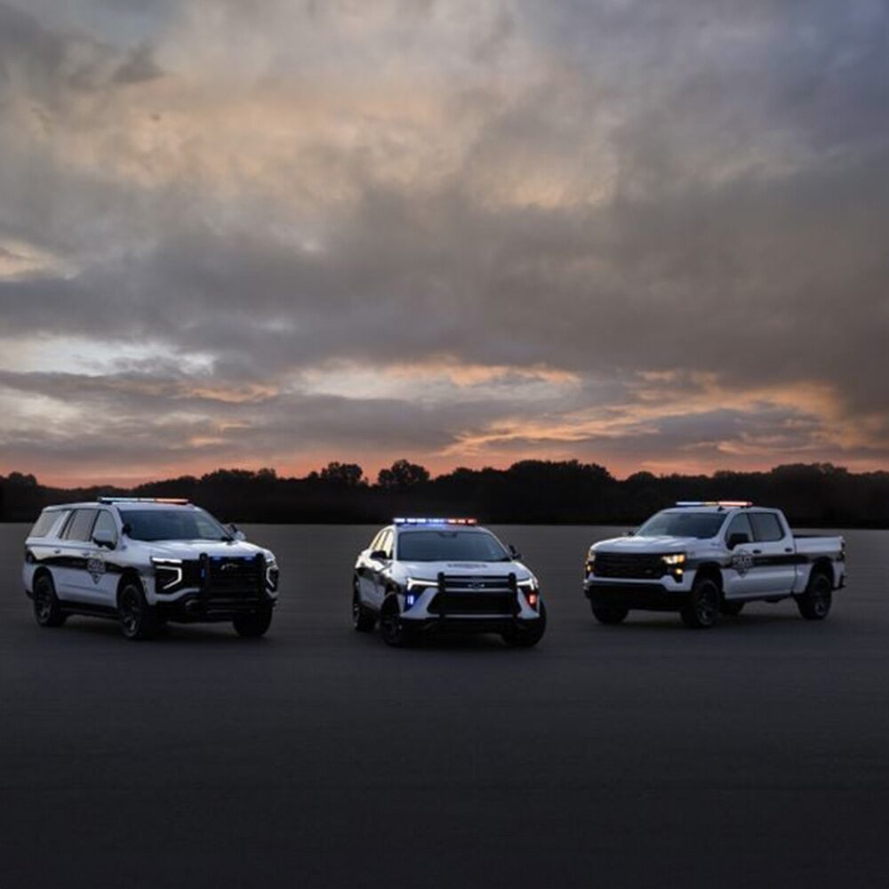 Three Chevrolet PPVs parked in a lot. 
