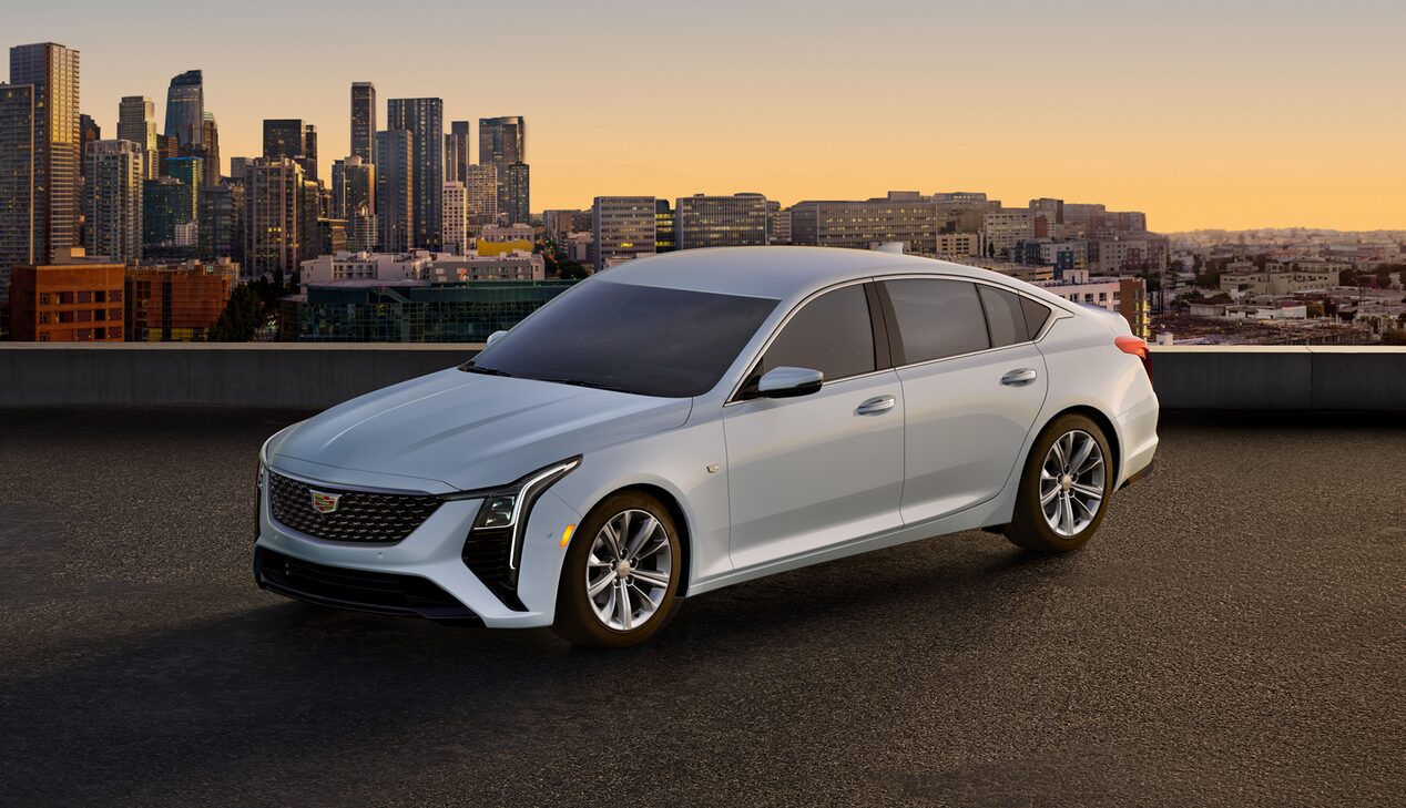 A White Chevy Malibu Parked on a City Street
