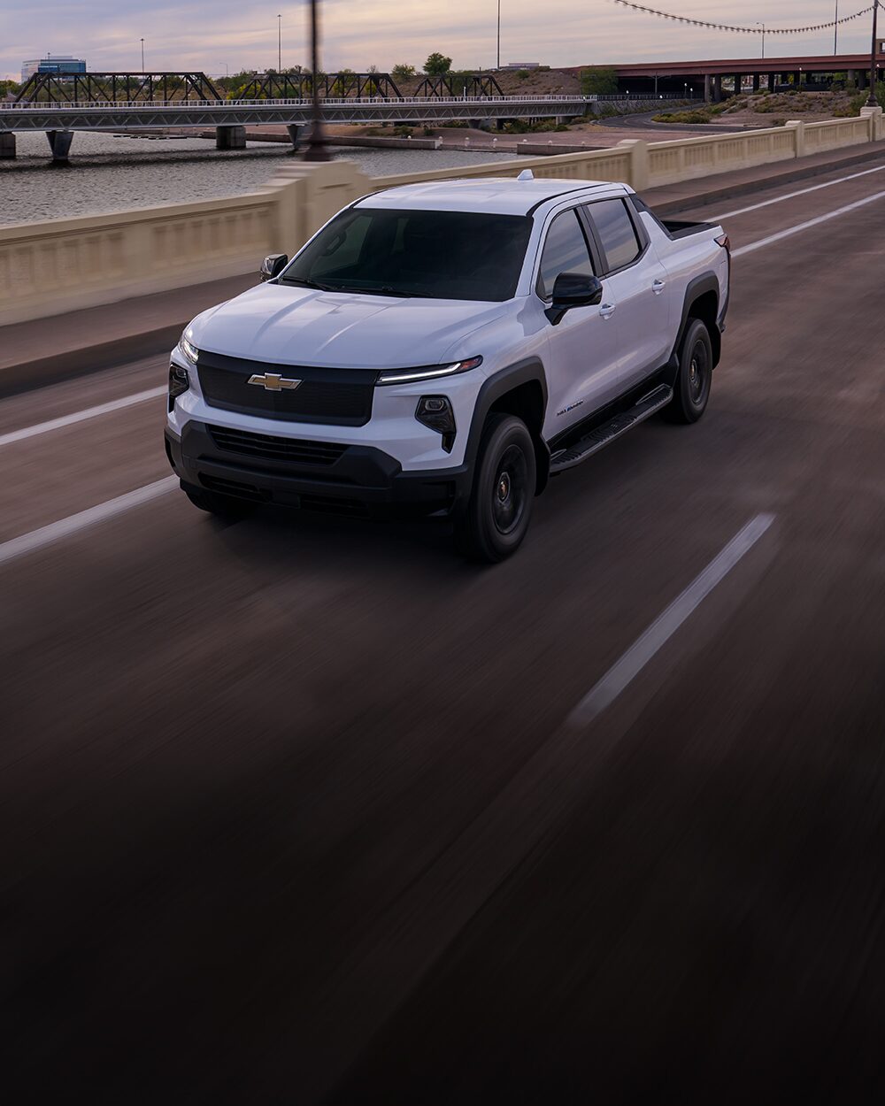 A Silverado EV driving down a highway