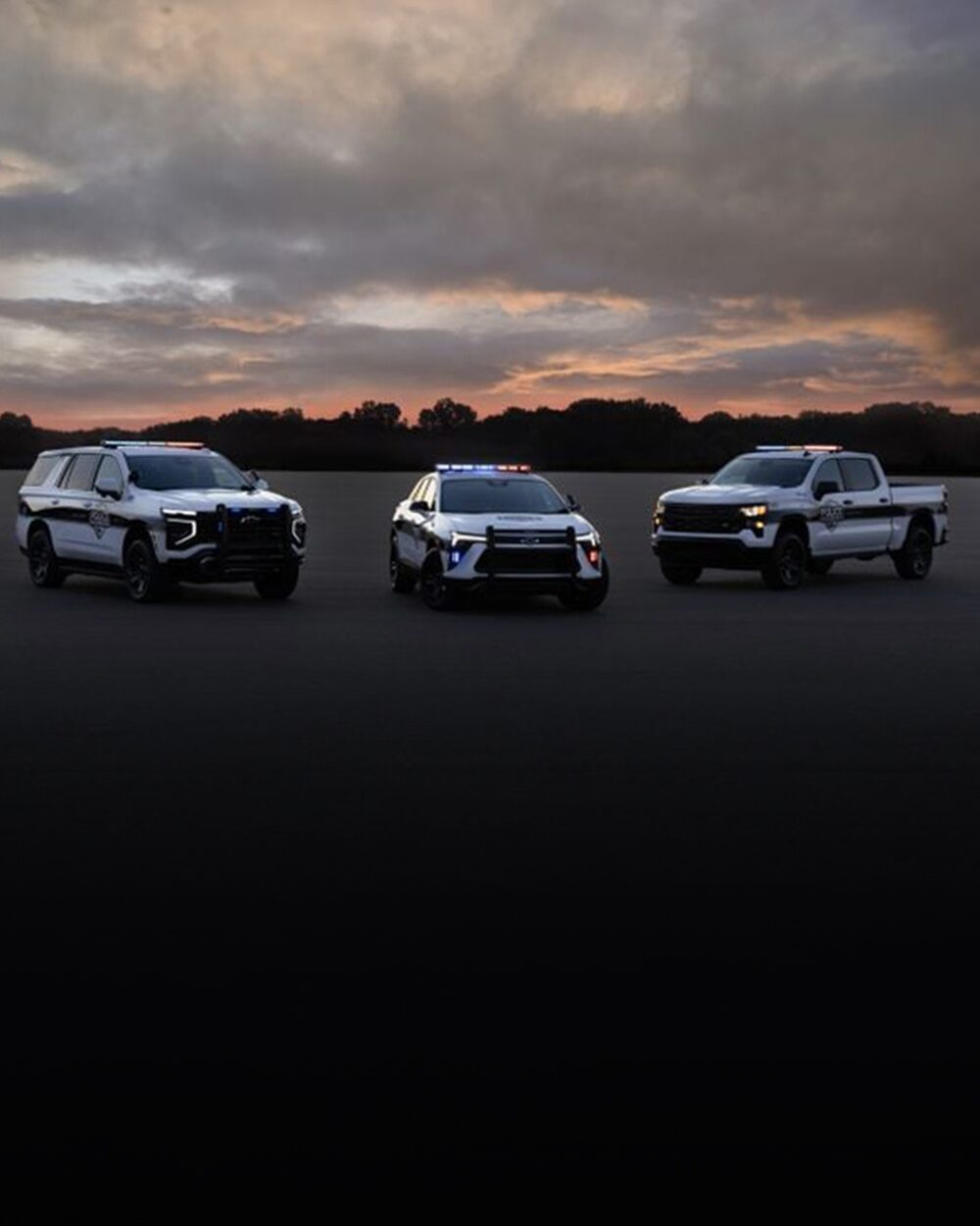 Three Chevrolet PPVs parked in a lot. 