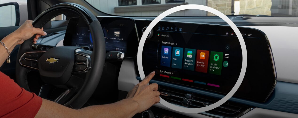 A person accessing the In-Vehicle Apps through the infotainment screen of an OnStar-subscribed GM vehicle.