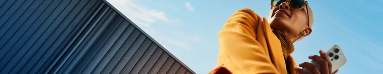 Close up of a woman holding her phone