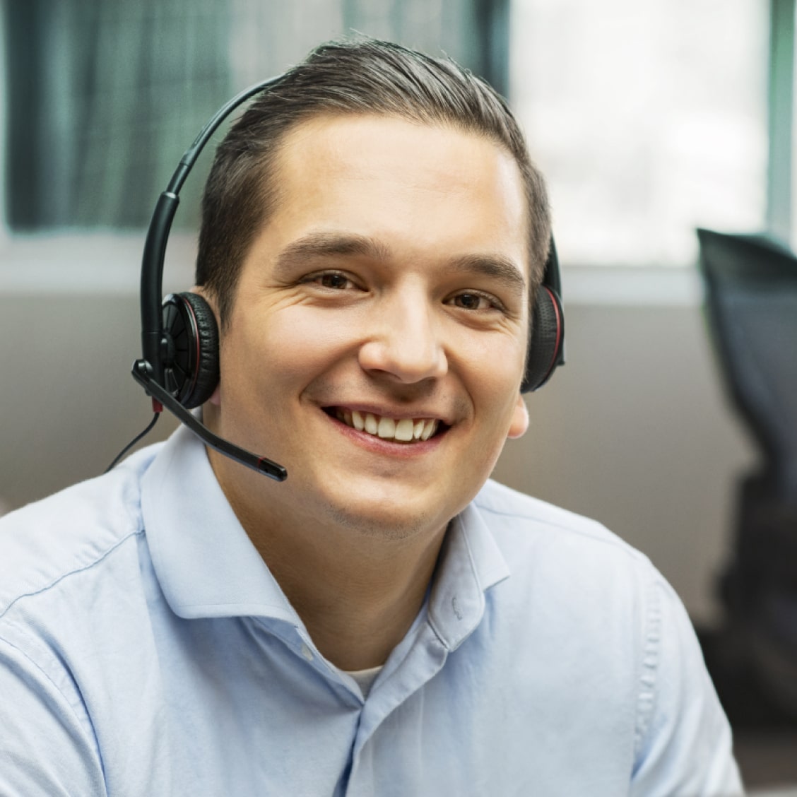 Male OnStar Advisor Smiling
